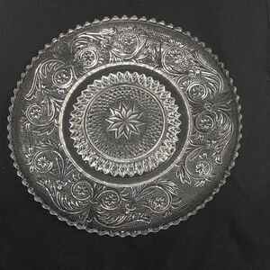 Early clear pressed glass 7" plate star and Fleur de lis pattern‎